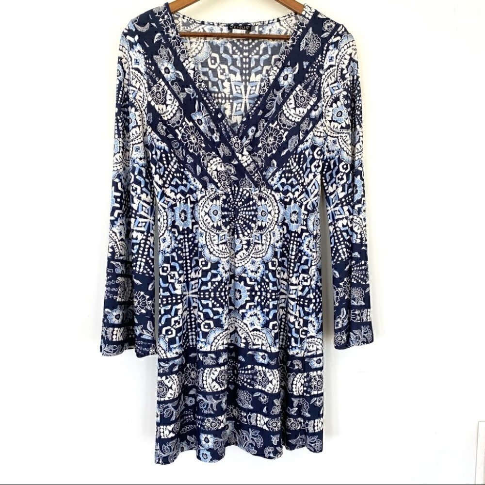 Venus stretch mini dress with surplice top and bell sleeves